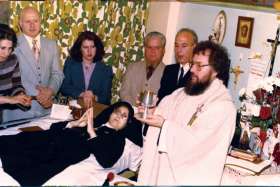 Fr. Claudio Piccinini celebrates Mass in 1977 in an all-purpose room in the Toronto hospital where Sr. Carmelina Tarantino professed her vows as the first Passionist Sister in Toronto. 