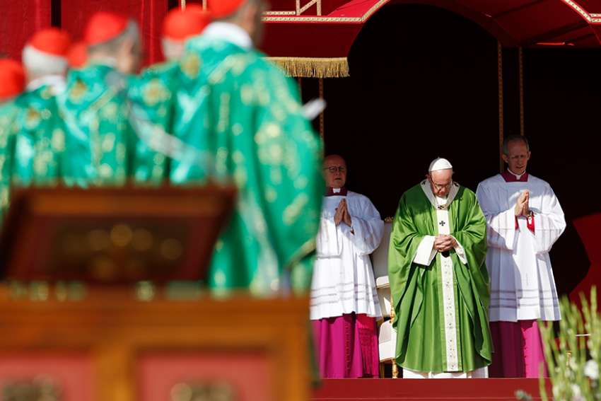 Pope Francis celebrates the opening Mass of the Synod of Bishops on young people, the faith and vocational discernment at the Vatican Oct 3.