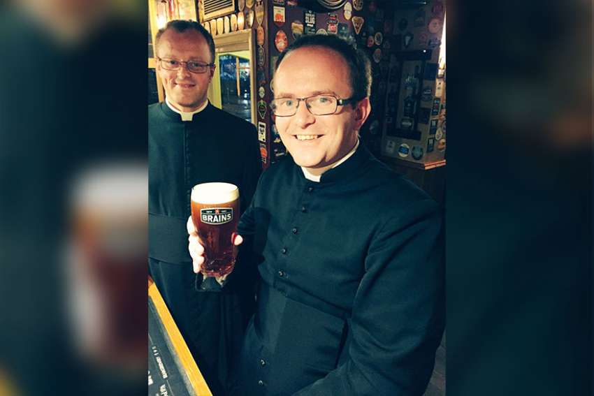 Seminarians of the Cardiff archdiocese enjoying a pint at The City Arms in Cardiff, Wales. 