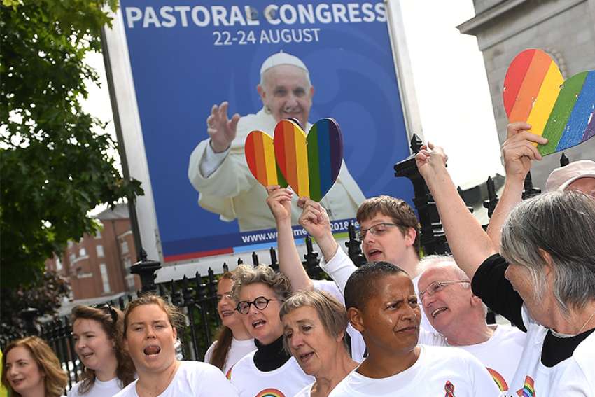 An LGBT choir sings outside the Pastoral Congress at the World Meeting of Families in Dublin Aug. 23.
