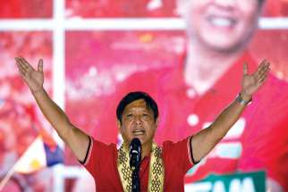 Philippine presidential candidate Ferdinand Marcos Jr., son of the late dictator Ferdinand Marcos, delivers a speech during a campaign rally in Lipa April 20.