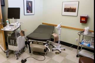 An exam room at the Planned Parenthood South Austin Health Center in Austin, Texas, is shown June 27. Charges against the creators of undercover videos of Planned Parenthood officials were dropped. 