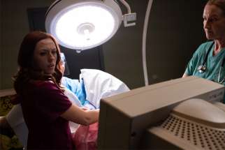 Abby Johnson, portrayed by Ashley Bratcher, reacts to what she is seeing on the ultrasound screen while assisting with an abortion in this clip from the movie &quot;Unplanned.&quot;