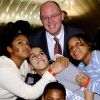 Kevin Ryan, president of Covenant House, is pictured with Covenant House children at left in this undated photo. His book Almost Home is climbing bestseller charts in Canada and the United States.