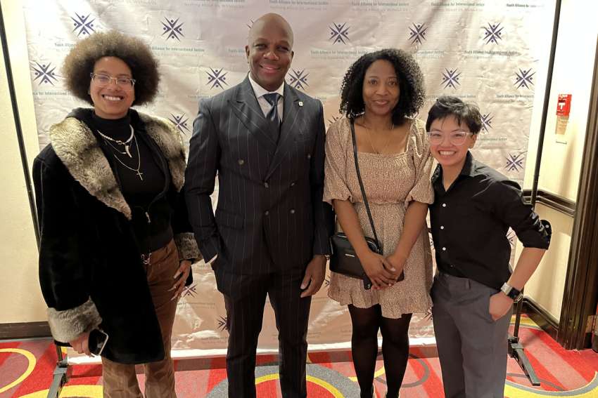Poetess Jadyn Hardie-Bardy, Olympic champion sprinter Donovan Bailey, YAIJ co-founder Carolyn Tinglin and Halton Catholic trustee Kirsten Kelly at a recent neurodiversity conference for Autism Awareness Month.