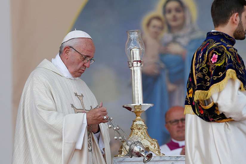 Pope Francis uses incense as he celebrates Mass in Vartanants Square in Gyumri, Armenia, June 25.