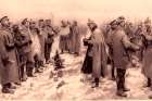 This drawing from The Illustrated London News in 1915 depicts a German officer photographing “a group of foes and friends” during the  Christmas Truce  of 1914 when soldiers on the front lines briefly set down their weapons and greeted one another to mark the special day.