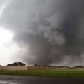 A massive tornado approaches the town of Moore, Okla., May 20. The mile-wide tornado touched down near Oklahoma City, killing at least 91 people, including 20 children, destroying homes, businesses and a pair of elementary schools in the suburb of Moore.