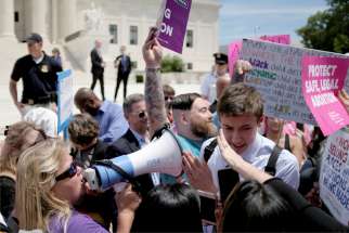 Pro-life protesters demonstrate during a protest of supporters of abortion outside the U.S. Supreme Court in Washington May 21, 2019.