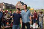 Ye Win (Nelson Lee) instructs Rev. Michael Spurlock (John Corbett) where to plant the crops to be grown in the fields at All Saints Church, in the new movie All Saints. At right is Spurlock. 