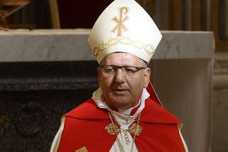 Chaldean Patriarch Louis Sako of Baghdad celebrates a liturgy in St. Peter&#039;s Basilica at the Vatican in this Feb. 4, 2013, file photo. Cardinal Sako said the church in Iraq is working with the government to prepare for Pope Francis&#039; planned March 5-8 visit to Iraq.
