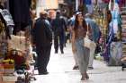 Tourists walks by souvenir shops in Jerusalem&#039;s Old City April 3, 2022.