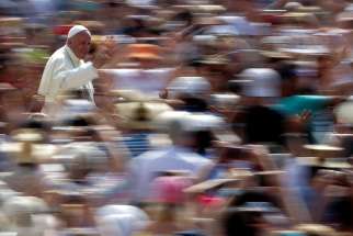 Pope Francis waves as he arrives for his general audience June 2017 in St. Peter&#039;s Square at the Vatican.