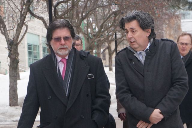 Defence lawyer Matthew Webber and Fr. Joe LeClair, right, head to court in Ottawa March 19 for LeClair&#039;s sentencing on charges of theft, fraud and breach of trust.