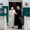 Pope Benedict XVI is assisted from his plane at the end of his pastoral visit to Mexico and Cuba at Ciampino airport in Rome March 29.