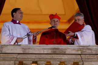 French Cardinal Jean-Louis Tauran announces &quot;Habemus papam!&quot; (We have a pope!) from the central balcony of St. Peter&#039;s Basilica in 2013 at the Vatican. Cardinal Tauran, 75, died July 5 in the United States.