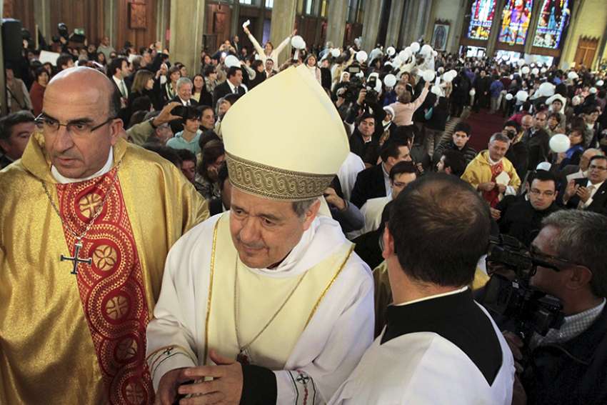 Bishop Juan Barros attends his first Mass at the Cathedral of St. Matthew in Osorno, Chile, Mar. 21, 2015. The Vatican said it had no reason to preclude Bishop Barros&#039; nomination after protestors charged he had covered up for a priest whom the Vatican later found guilty of sexually abusing minors.