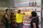 Shoppers at a supermarket in Stepanakert, Nagorno-Karabakh, find shelves lacking items amid a regional food shortage. The shortage is the result of a blockade in the Lachin corridor linking Armenia and Nagorno-Karabakh, an Armenian-populated enclave surrounded by Azerbaijan.