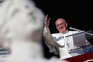 ope Francis waves as he leads the Angelus in St. Peter&#039;s Square at the Vatican Dec. 26.
