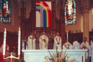 Photograph of Cardinal Bernardin presiding over Mass in 1991 at Resurrection Parish. 