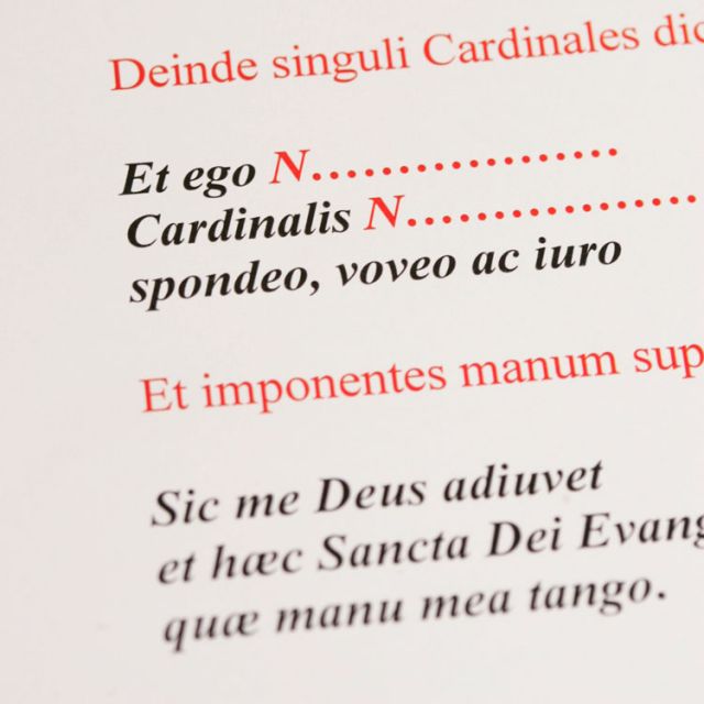 This is a detail view of the oath in Latin that each cardinal elector takes before the start of the conclave. Placing a hand on the Gospels, each elector swears to uphold the rules and secrecy of the conclave. This copy is from a collection of documents retained by U.S. Cardinal William H. Keeler from the 2005 conclave.