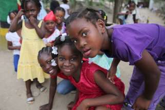 Students at St. Martin de Porres School in Hinche, Haiti, are seen Feb. 13 during Carnival activities at the school. 