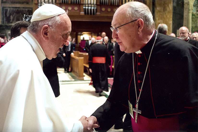 Pope Francis greets Bishop Kevin J. Farrell of Dallas in Washington in September 2015. Pope Francis has named the Texas bishop to head the Vatican&#039;s new office for laity, family and life.