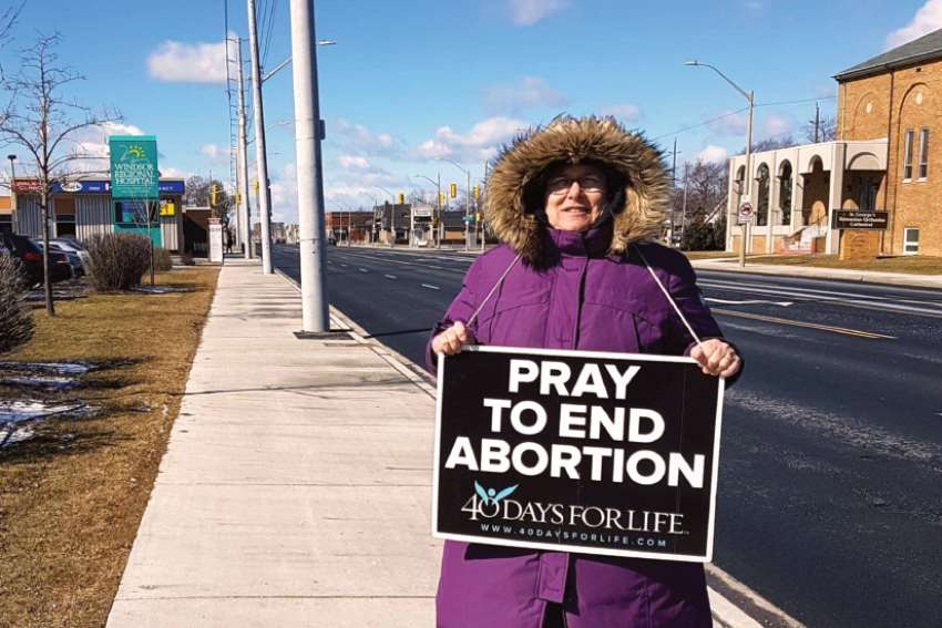 Laurie Eberhardt, who is running the Windsor 40 Days for Life campaign, standing outside the entrance to Windsor Regional Hospital. 
