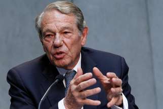 Joaquin Navarro-Valls, who served as director of the Vatican press office from 1984-2006, speaks during a Vatican press conference in this 2014 file photo. He died July 5.