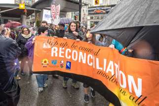 Participants took part in a circle dance on Yonge and Dundas Streets in Toronto May 31 to mark the end of the Truth and Reconciliation Commission&#039;s inquiry on residential schools in Canada.