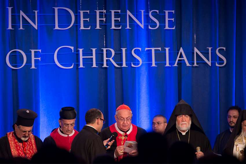 Cardinal Leonardo Sandri, prefect of the Congregation for Eastern Churches, leads a prayer during an ecumenical service at the Omni Shoreham Hotel in Washington Sept. 9, 2014. The Vatican has lifted its ban on the ordination of married men to the priesthood in Eastern Catholic churches outside their traditional territories.