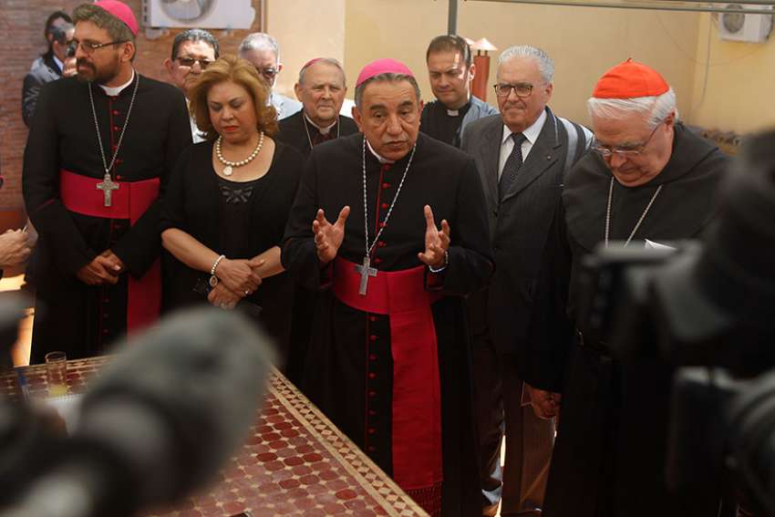 Archbishop Jose Domingo Ulloa Mendieta of Panama leads dignitaries and journalists in a moment of silent prayer June 8 for the One Minute for Peace initiative at a press briefing. The briefing followed the &quot;ad limina&quot; meeting at the Vatican between Pope Francis and the Panamanian bishops.