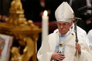 Pope Francis carries his crosier as he celebrates Mass marking the feast of Mary, Mother of God, in St. Peter&#039;s Basilica at the Vatican Jan. 1.