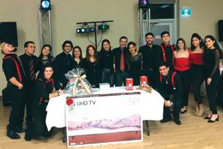 Young adult members of Toronto’s Ita Gaudium organized a raffle during a dinner dance to raise enough money to go to World Youth Day in Panama City. 