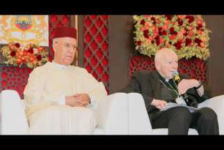 Cardinal Theodore E. McCarrick, retired archbishop of Washington, speaks alongside Sheik Abdallah Bin Bayyah during the Marrakesh conference on the rights of religious minorities in the Muslim world, in Morocco Jan. 27.