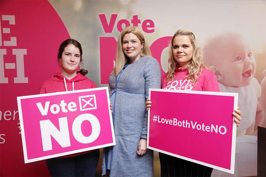 Amy Grenhan, Sinead Slattery and Miriam Smith pose at the launch of the Love Both campaign in Dublin. A May 25 referendum proposes to remove the Eighth Amendment to the Irish Constitution, which gives protection for unborn children.