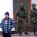 Armed men patrol at the airport in Crimea, Ukraine, Feb. 28. Church leaders in Ukraine appealed for peace in the Crimea peninsula as the government accused Russia of &quot;carrying out an armed invasion.&quot;
