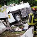A firefighter walks amid the wreckage of a bus that crashed near the town of Avellino in southern Italy July 29. At least 38 people died when the bus filled with pilgrims returning from a Catholic shrine tour plunged off an elevated highway.