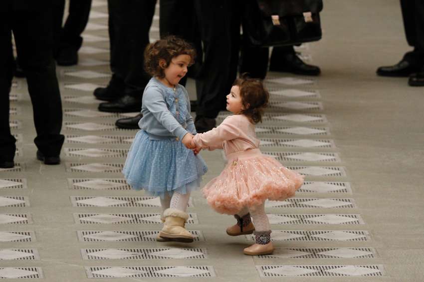 Dancing, even without music, is always a good thing, as these two girls showed at the Vatican earlier this year while Pope Francis greeted people during his general audience.