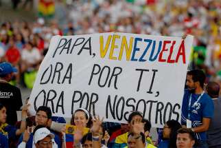 A sign calls attention to Venezuela as Pope Francis leads the World Youth Day prayer vigil at St. John Paul II Field in Panama City Jan. 26, 2019. 