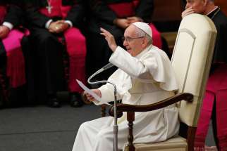 Pope Francis gestures during his general audience in Paul VI hall at the Vatican Dec. 14.