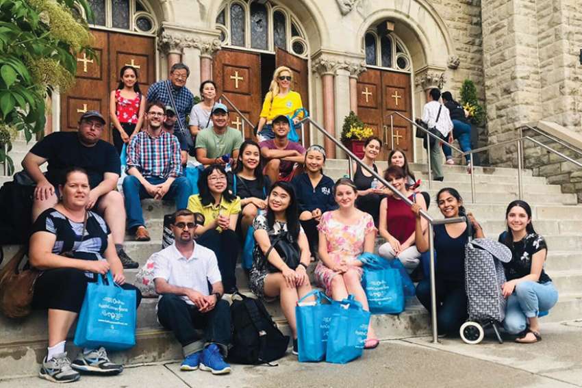 Faith Connections volunteers take part in Street Patrol to feed the homeless on the streets of downtown Toronto in 2019.