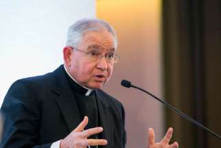 Archbishop Jose H. Gomez of Los Angeles, who is vice president of the U.S. Conference of Catholic Bishops, gives the closing keynote address Jan. 19 at Vatican-sponsored conference on mass migration and humanitarianism at the University of California in Los Angeles.