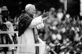 St. John Paul II greets throngs of Poles waiting for a glimpse of their native son at the monastery of Jasna Gora in Czestochowa during his 1979 trip to Poland.