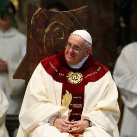 Pope Francis smiles during Mass at the Church of the Gesu in Rome Jan. 3. The Mass was celebrated on the feast of the Most Holy Name of Jesus in thanksgiving for the recent canonization of Jesuit St. Peter Faber.