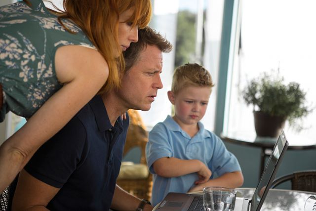 Kelly Reilly, Greg Kinnear and Connor Corum star in a scene from the movie &quot;Heaven Is For Real.&quot; The Catholic News Service classification is A-I -- general patronage. The Motion Picture Association of America rating is PG -- parental guidance suggested. Some material may not be suitable for children.