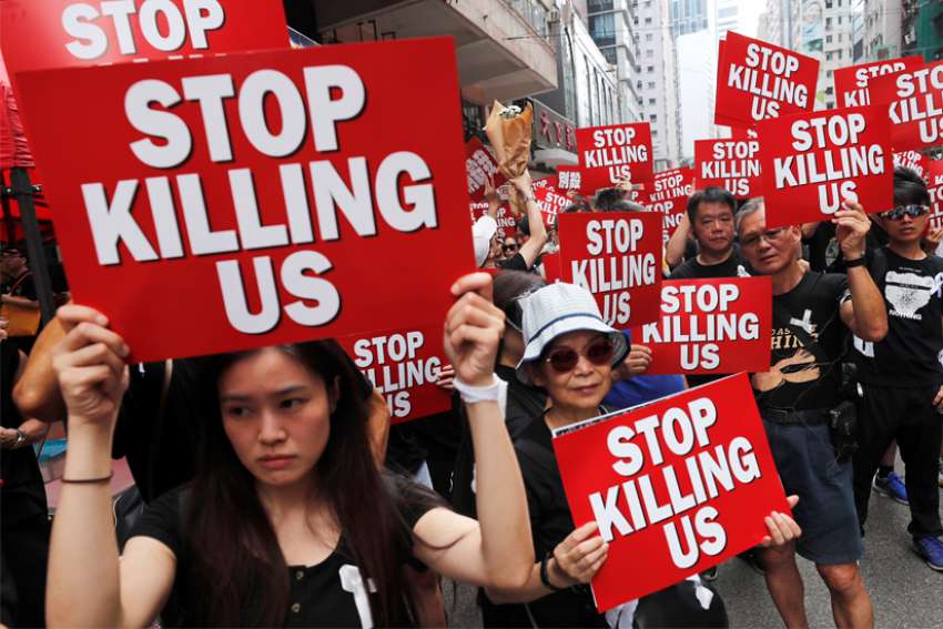Protesters attend a demonstration June 16, 2019, demanding Hong Kong&#039;s leader step down and withdraw extradition legislation. Although chief executive Carrie Lam announced June 15 that she had suspended the bill, Hong Kong residents were not satisfied; an estimated 2 million people turned out for the march.