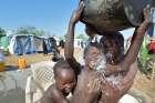Girls bathe inside a U.N. base in Juba, South Sudan, March 5.