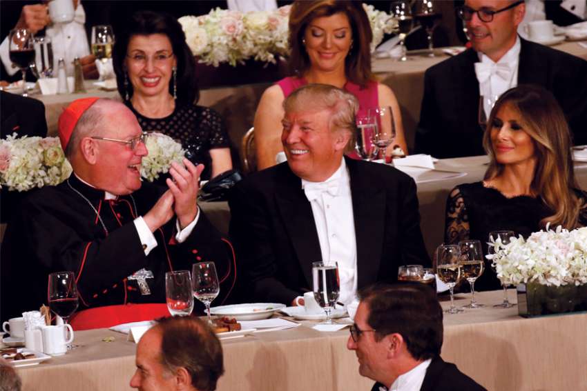 Donald Trump and New York Cardinal Timothy Dolan share a laugh during the 71st annual Alfred E. Smith Memorial Foundation Dinner in New York City in 2016.