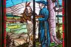St. Jean de Brebeuf and Joseph Chiwatenhwa are depicted in a stain-glass window at the Martyrs’ Shrine in Midland, Ont.